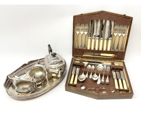 A wooden cased canteen of Sheffield silver plated cutlery for six place settings, along with a collection of metal ware, teap