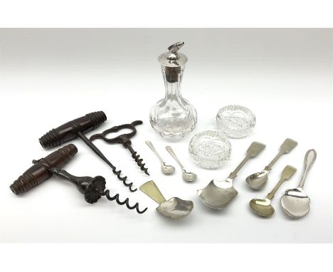 A small glass bottle with silver mounted cover with finial modelled in the form of a fish, hallmarked J B Chatterley &amp; So