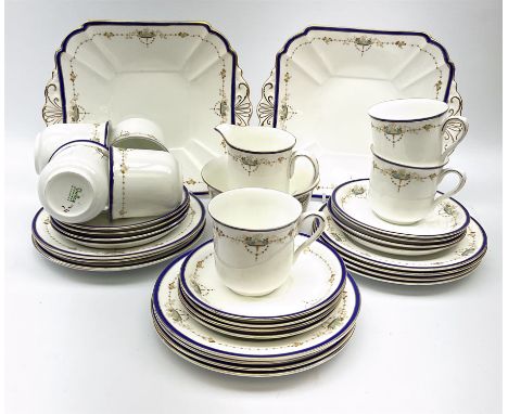 Shelley teawares, decorated in the 11422 pattern, comprising seven cups, twelve saucers, twelve plates, milk jug, slop bowl a