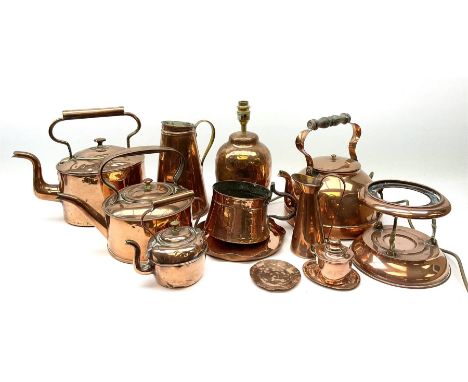 A group of Victorian and later copper, to include kettles, jugs, hammered table lamp base, etc. 