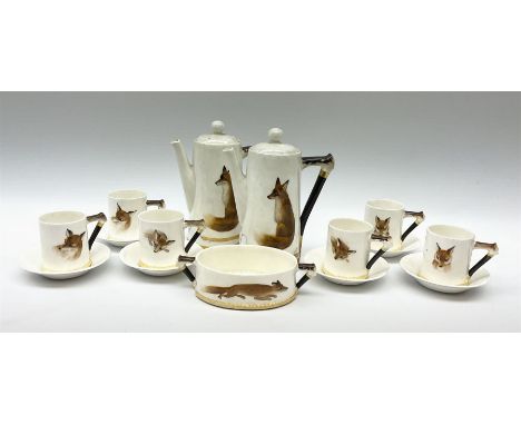 A Royal Doulton Reynard the Fox pattern coffee set, comprising two coffee pots, open sucrier, six coffee cans and six saucers