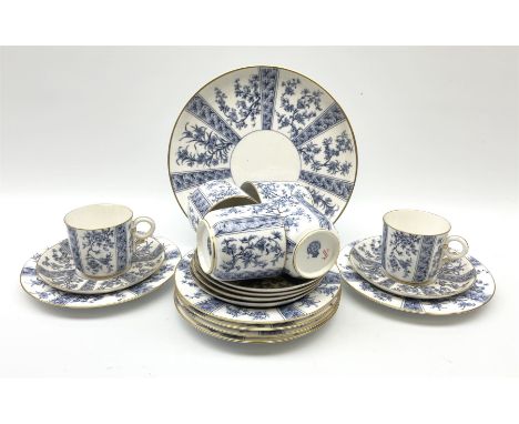 A late 19th century Royal Worcester tea set for six, comprising teacups, saucers, side plates and cake plate, decorated with 