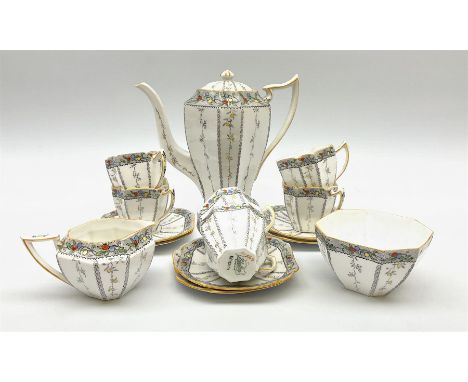 An Art Deco Shelley Queen Anne shape coffee set for six decorated in the Fruit Border pattern, pattern number 1563, comprisin