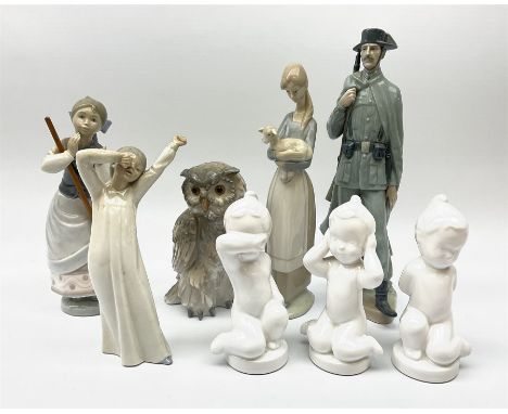 Collection of Lladro figures, comprising of Spanish Policeman model No. 4889, Girl with Lamb model No.4505, A Clean Sweep, mo