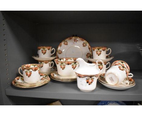 A part tea service in an imari design by The Rock Pottery co