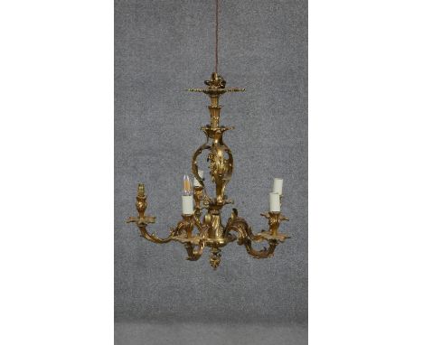 An antique Recoco style gilt brass floral and foliate design five branch chandelier. D.61 H.51cm 