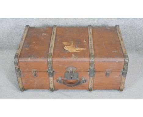 A vintage metal and oak bound travelling trunk. H.34 x W.78 x D.50cm 