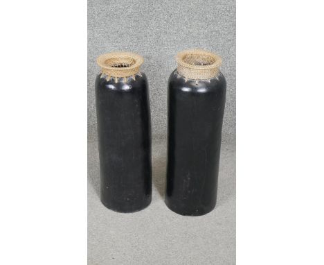 Two large painted ceramic vases with woven bamboo necks. H.44CM 
