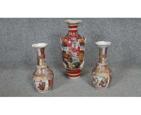 A collection of three early 20th century hand painted Japanese Satsuma ware ceramic vases, decorated with figures and flowers