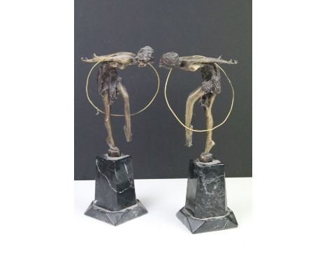 Pair of bronze Art Deco style female performers with hoops, mounted on marble pedestal bases, approx 28cm tall 