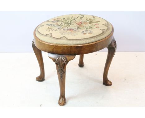 Early 20th century walnut stool, with shell carved cabriole legs, with floral woolwork tapestry seat, 43cm high x 54cm wide x