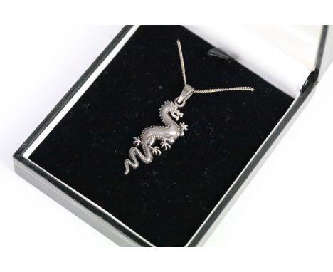 Silver Pendant in the form of a Chinese Dragon on a Silver Chain 