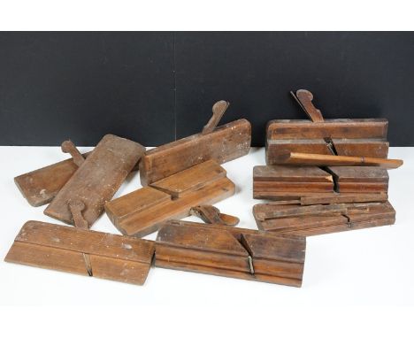 Collection of ten vintage wooden moulding planes 