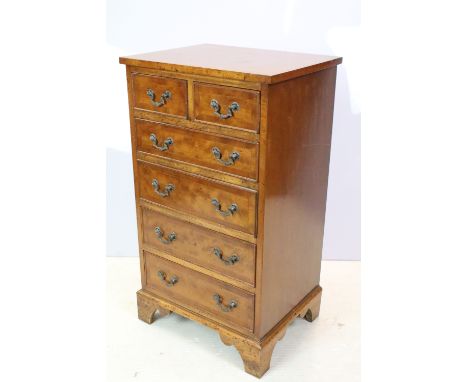 20th century yew wood chest of two short and four long drawers on bracket feet, 84cm high x 47cm wide x 37cm deep 