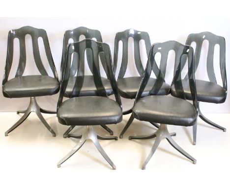 Mid century Howell Division of Interlake, set of six black swivel chairs, each with black leatherette seat and semi opaque pe