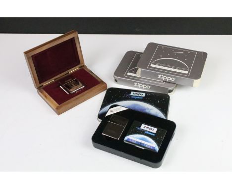 Three boxed / tinned Zippo lighters to include 2 x Millennium Edition 'One World One Future' lighters, and a D-Day Normandy 5