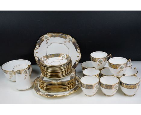 Early 20th Century Edwardian Art Nouveau Salisbury china tea service 11 cups, 12 saucers, 9 side plates, two sandwich plates,
