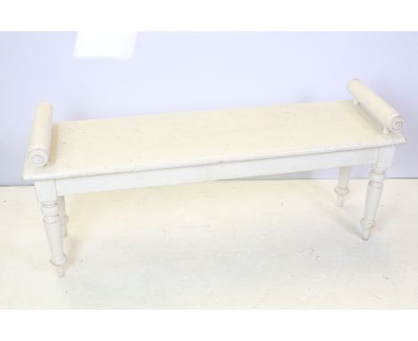 Early 20th century painted pine bench, the two ends with scroll handles, on turned tapering legs, 51cm high x 115.5cm wide x 