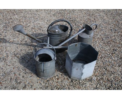 Group of three vintage galvanised watering cans, tallest approx 40cm 