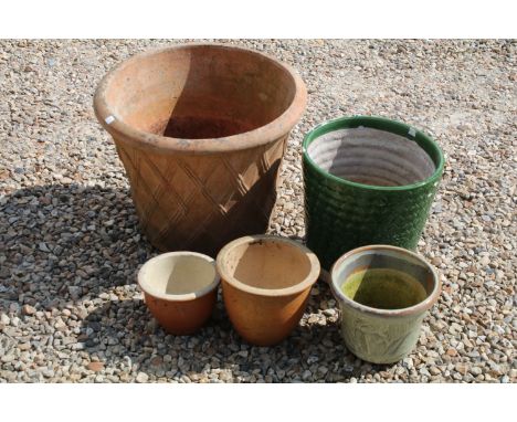 Large terracotta planter with relief lattice decoration (approx 38cm tall), together with four smaller garden planters 