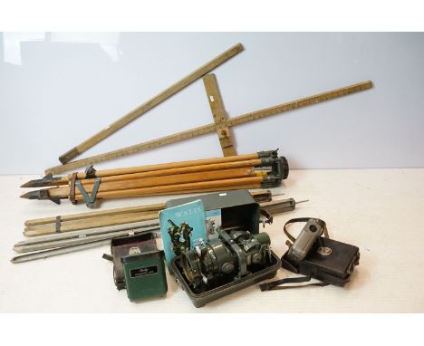 Watts Microptic Theodolite No. 1 in case with instruction manual and tripod stand, together with two Cowley levels, and measu