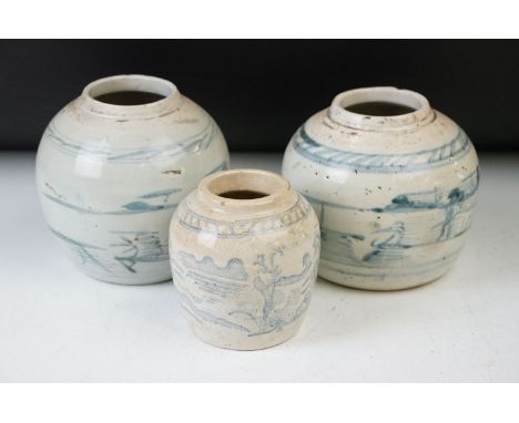 Three Chinese antique white and blue ceramic ginger jar storage pots. Tallest - 13cm, smallest - 10cm all with markings to ba