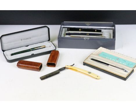 A small group of collectables to include a selection of pens to include gold knibed fountain pens and a cut throat razor. 