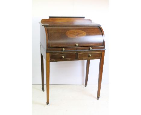 Antique roll top secretaries desk with oval inlay decoration, two drawers incorporating a leather lined pull out writing shel