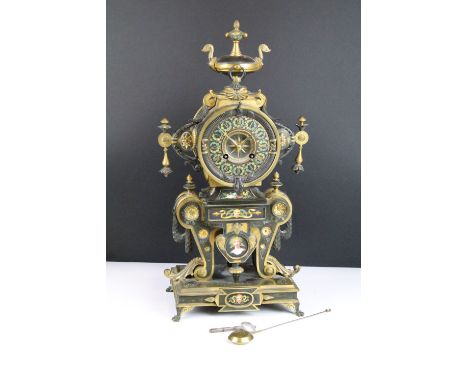 19th Century French Neo-Grec polychrome painted gilt and patinated bronze mantel clock, having a round dial with painted laur