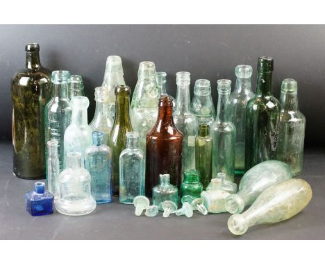 Selection of Antique and Vintage glass and ceramic bottles of varying shapes and sizes, Torpedo bottle, Codd bottles, stopper
