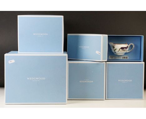Wedgwood boxed collection of 'Mythical Creatures' tea set items, two cups and saucers, cream jug, tea pot and small sized cov