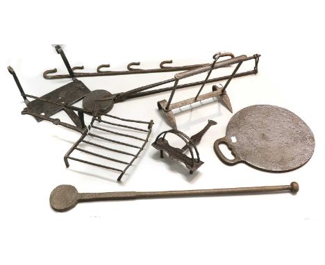 A Cast Waffle Iron, 19th century, the round plates inscribed 1 1/2 and with medallion disegnes71cm longDownhearth Toaster, 18