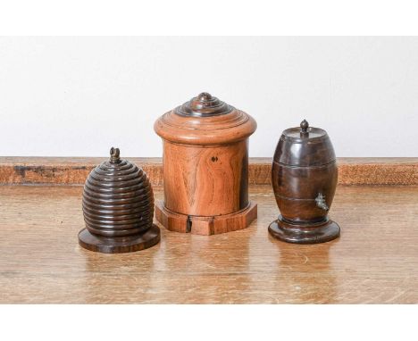 A Lignum Vitae String Box, 19th century, formed as a beehive, with cutter and bevelled plinth8.5cm highA Similar Example, for