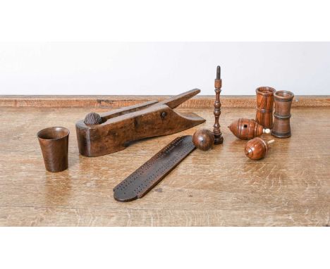 A Trap Ball, 19th century, of boot form32cm longA Cup and Ball, with muli-knopped cupcup 178cm longA Treen Cribbage Board30cm