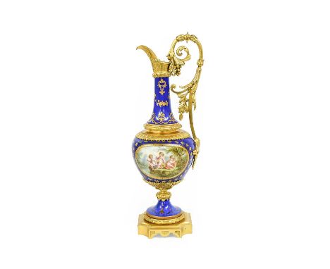 A Sèvres Style Porcelain and Gilt Metal Mounted Ewer, early 20th century, blue ground, with tooled gilding and enamelled with