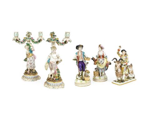 A Pair of Sitzendorf Porcelain Figural Candlesticks, 19th century, a young man harvesting corn together with a companion, bot