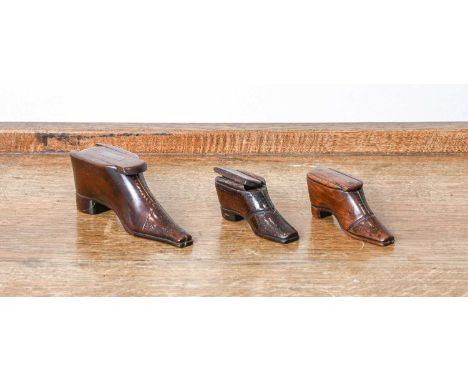  A Treen Snuff Box, early 19th century, of boot form, with sliding coverand having pique inlay14.5cm longTwo further Smaller 
