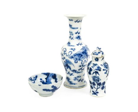 A Chinese Porcelain Yen Yen Vase, Kangxi mark but 19th century, painted in underglaze blue with lion dogs and cloud scrolls 2