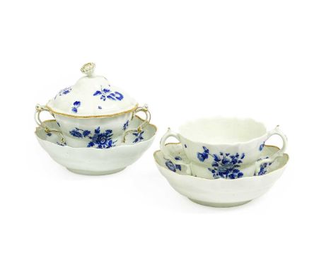 A Worcester Twin-Handled Chocolate Cup, Cover and Stand, circa 1770, of ogee form, with floral moulded knop and pierced scrol