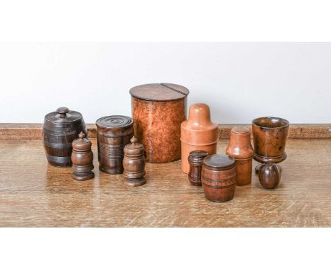 An Amboyna Tea Caddy, 19th century, of cylindrical form and with hinged cover12.5cm highTwo Apothecary Glass Bottles in Treen