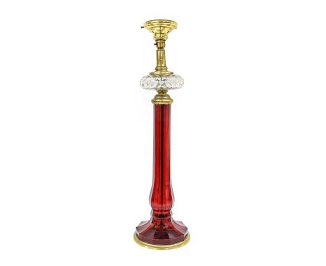 A Gilt-Metal-Mounted Ruby Glass Lamp Base, late 19th/early 20th century, of panelled slender baluster form, on domed foot, th