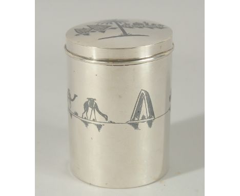 A FINE IRAQI NIELLO INLAID SILVER CYLINDRICAL BOX; possibly a tea caddy, 9cm high.