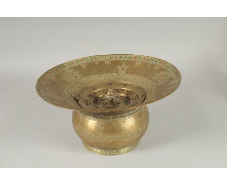 A 19TH CENTURY PERSIAN OR CENTRAL ASIAN BUKHARA BRASS BASIN, 30cm diameter.