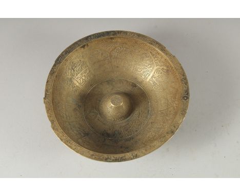 A 19TH-20TH CENTURY PERSIAN QAJAR ENGRAVED BRASS MAGIC BOWL, with panels of calligraphy, 16cm diameter.