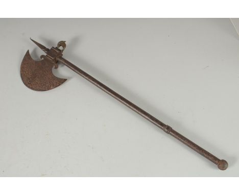 A 19TH CENTURY INDIAN SILVER INLAID STEEL AXE with a concealed blade within the handle, 56cm long.