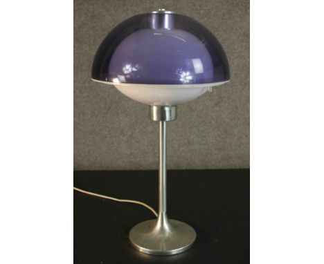 A Robert Welch Lumitron table lamp, stainless steel tulip design with weighted base and two part plastic shade in white, and 