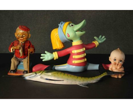 Three vintage toy characters and a fibreglass wall mounted swordfish. The wind up tin plate toy an old gentleman smoking a ci