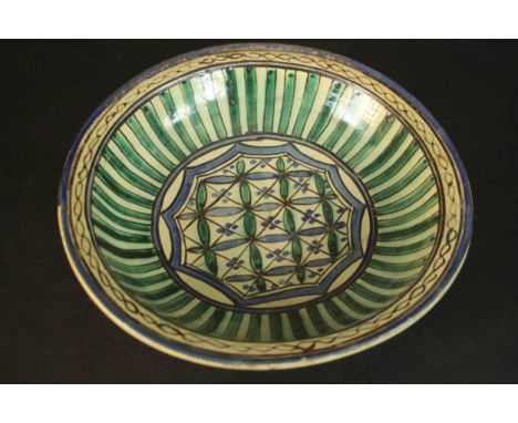 An early 20th century large Qajar green and blue geometric design ceramic bowl. H.10 Dia.36cm. 