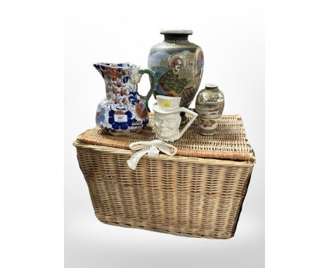 A wicker hamper, two Japanese export vases, an Imari vase, and a Sandland ware character jug.