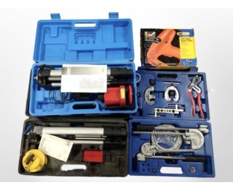 A Tacwise staple tacker/nailer, together with a cased pipe bender and two laser levels. (1 box)